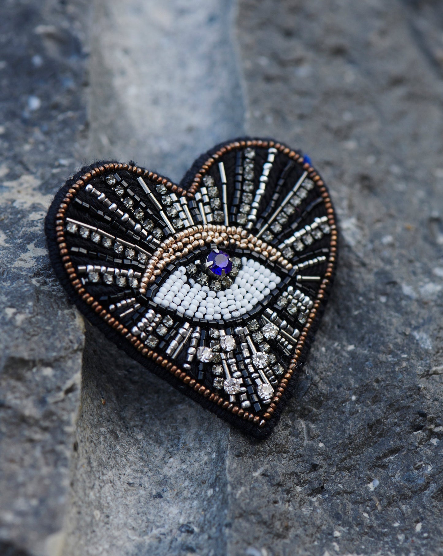 Lamarr eye brooch