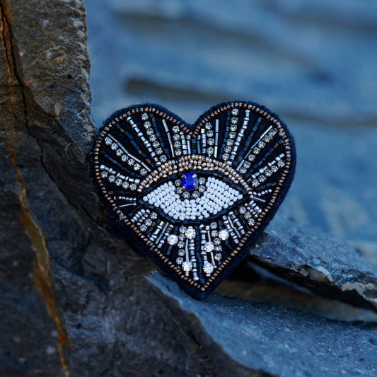 Lamarr eye brooch